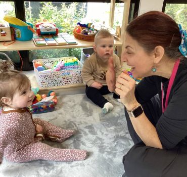 Babies playing with an educator in the Romsey Early Learning nursery