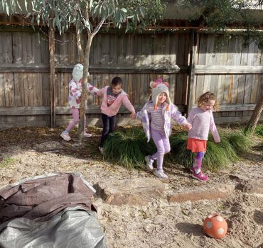 Children exploring the garden at Romsey Early Learning